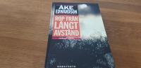 Rop från långt avstånd : Kriminalroman